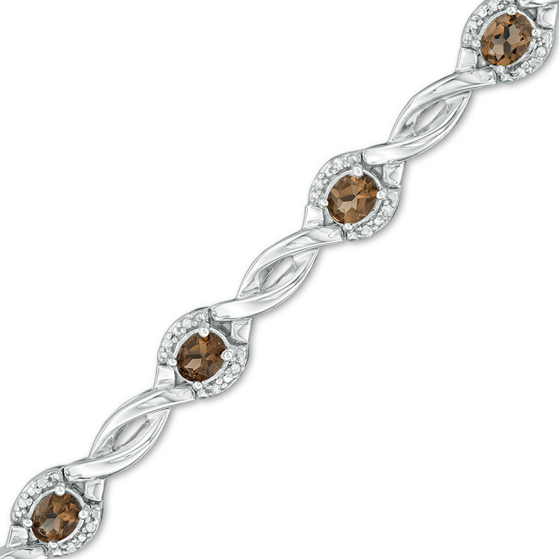 Oval Smoky Quartz and 0.15 CT. T.W. Diamond Frame Twist Station Bracelet in Sterling Silver - 7.5"|Peoples Jewellers