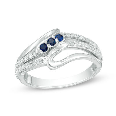 Lab-Created Blue Sapphire and 0.23 CT. T.W. Diamond Three Stone Split Shank Ring in Sterling Silver