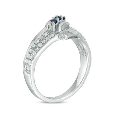 Lab-Created Blue Sapphire and 0.23 CT. T.W. Diamond Three Stone Split Shank Ring in Sterling Silver