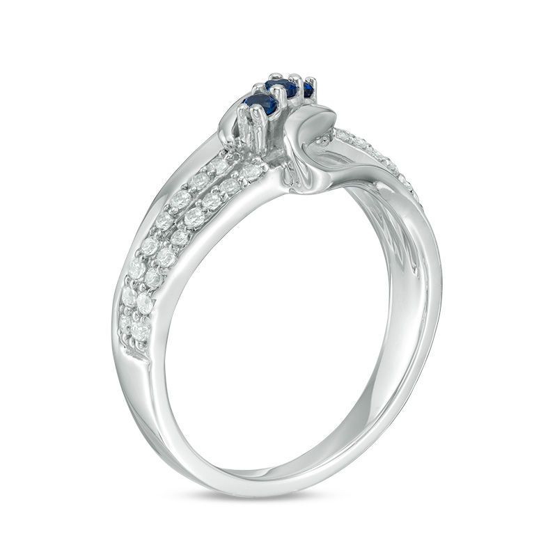 Lab-Created Blue Sapphire and 0.23 CT. T.W. Diamond Three Stone Split Shank Ring in Sterling Silver|Peoples Jewellers