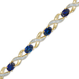 Oval Lab-Created Blue Sapphire and Diamond Accent &quot;XO&quot; Bracelet in 10K Gold