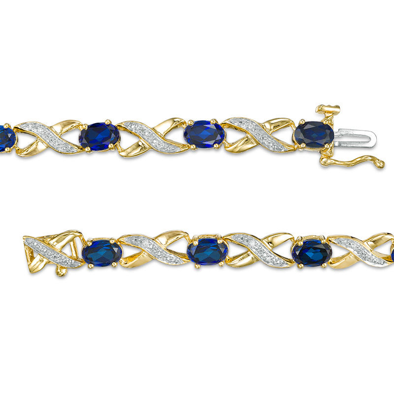 Oval Lab-Created Blue Sapphire and Diamond Accent "XO" Bracelet in 10K Gold|Peoples Jewellers