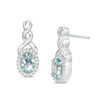 Thumbnail Image 1 of Oval Aquamarine and 0.11 CT. T.W. Diamond Frame Twist Drop Earrings in Sterling Silver