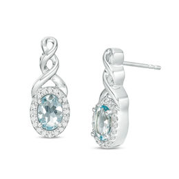 Oval Aquamarine and 0.11 CT. T.W. Diamond Frame Twist Drop Earrings in Sterling Silver