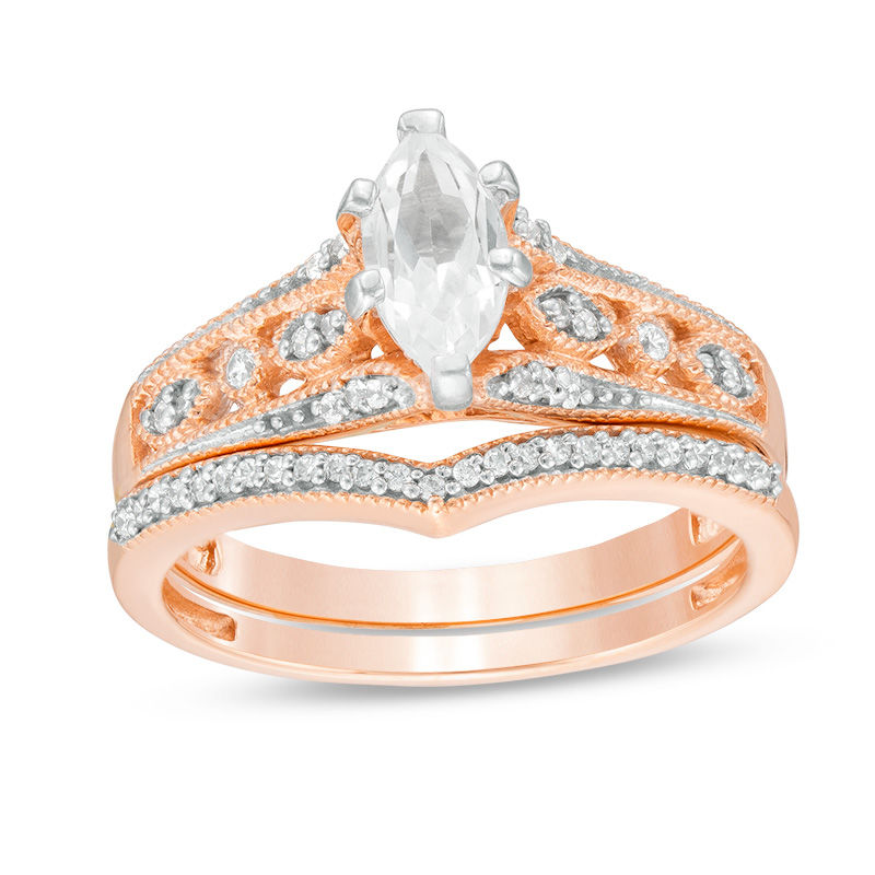 Lab-Created Marquise White Sapphire and 0.18 CT. T.W. Diamond Bridal Set in 10K Rose Gold