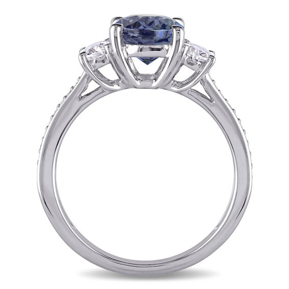 Oval Tanzanite and 0.60 CT. T.W. Diamond Three Stone Ring in 14K White Gold