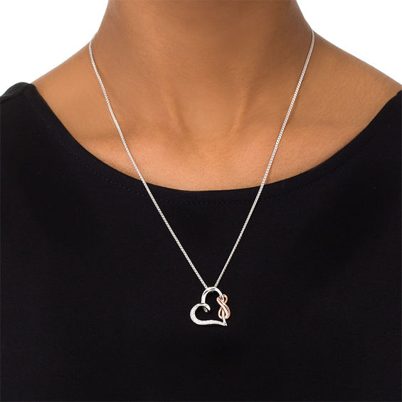 0.11 CT. T.W. Diamond Tilted Heart with Infinity Bolo Necklace in Sterling Silver and 10K Rose Gold - 30"