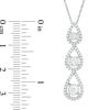 Thumbnail Image 1 of 0.75 CT. T.W. Diamond Three Stone Teardrop Frame Linear Pendant in 10K White Gold