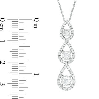 0.75 CT. T.W. Diamond Three Stone Teardrop Frame Linear Pendant in 10K White Gold