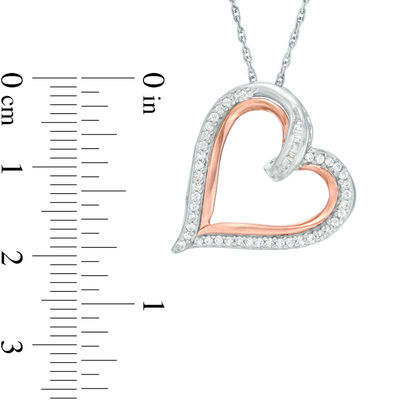 0.23 CT. T.W. Baguette and Round Diamond Tilted Heart Pendant in Sterling Silver and 10K Rose Gold