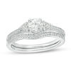 Lab-Created White Sapphire and 0.11 CT. T.W. Diamond Tri-Sides Bridal Set in Sterling Silver