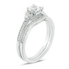 Lab-Created White Sapphire and 0.11 CT. T.W. Diamond Tri-Sides Bridal Set in Sterling Silver