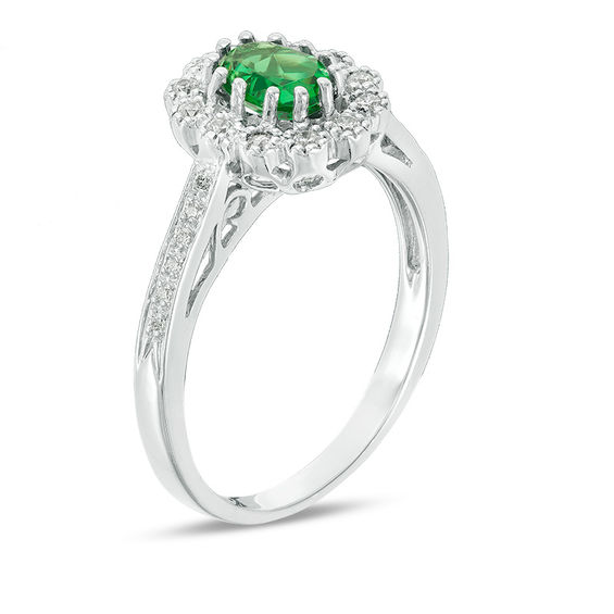 Oval Lab-Created Emerald and 0.15 CT. T.W. Diamond Flower Frame Engagement Ring in Sterling Silver