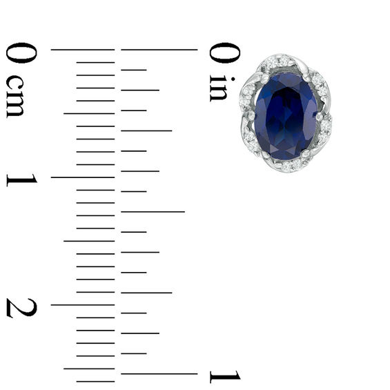 Oval Lab-Created Blue Sapphire and 0.09 CT. T.W. Diamond Frame Stud Earrings in Sterling Silver