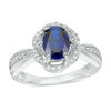 Thumbnail Image 0 of Oval Lab-Created Blue Sapphire and 0.09 CT. T.W. Diamond Frame Ring in Sterling Silver