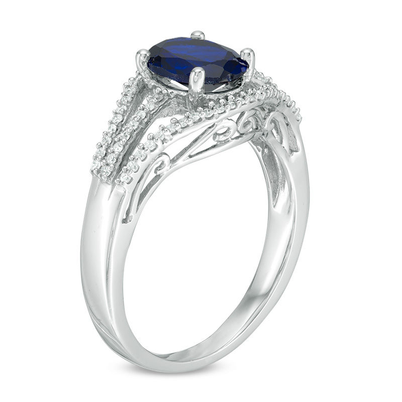 Oval Lab-Created Blue Sapphire and 0.18 CT. T.W. Diamond Split Shank Ring in Sterling Silver