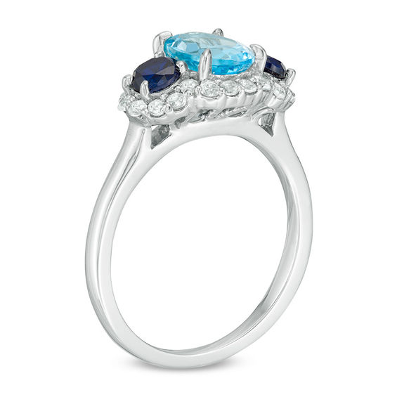 Oval Blue Topaz, Lab-Created Blue and White Sapphire Three Stone Ring in Sterling Silver