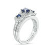 Lab-Created Blue and White Sapphire Frame Three Stone Bridal Set in 10K White Gold