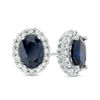 Thumbnail Image 0 of Oval Blue Sapphire and 0.38 CT. T.W. Diamond Frame Stud Earrings in 10K White Gold