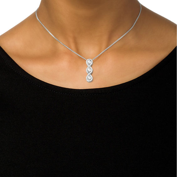 0.23 CT. T.W. Diamond Twist Frame Three Stone Bolo Necklace in Sterling Silver - 30"