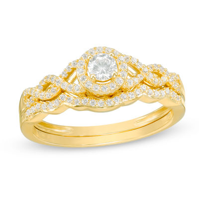 0.37 CT. T.W. Diamond Frame Twist Bridal Set in 10K Gold