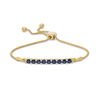 Lab-Created Sapphire Nine Stone Bar Bolo Bracelet in 10K Gold