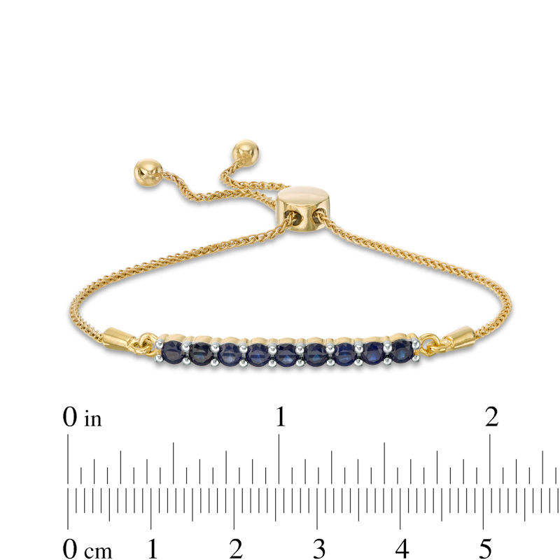 Lab-Created Blue Sapphire Nine Stone Bar Bolo Bracelet in 10K Gold - 9.5"|Peoples Jewellers