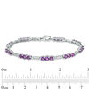 Amethyst and 0.09 CT. T.W.  Diamond Three Stone Station Bracelet in 10K White Gold - 7.5"