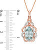 Thumbnail Image 1 of Pear-Shaped Aquamarine and Lab-Created White Sapphire Free-Form Frame Pendant in 10K Rose Gold