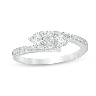 0.45 CT. T.W. Diamond Three Stone Bypass Ring in 10K White Gold