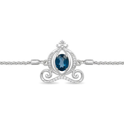 Enchanted Disney Cinderella Oval Blue Topaz and 0.085 CT. T.W. Diamond Carriage Bolo Bracelet in Sterling Silver - 9.5"