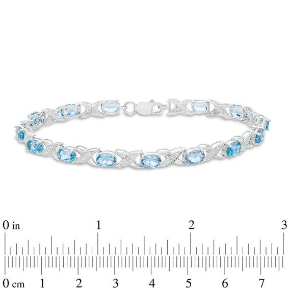 Sideways Oval Swiss Blue Topaz and Diamond Accent "XO" Bracelet in Sterling Silver - 7.25"