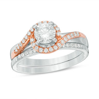 0.83 CT. T.W. Certified Canadian Diamond Swirl Bypass Bridal Set in 14K Two-Tone Gold (I/I2)