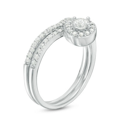 0.60 CT. T.W. Diamond Swirl Bridal Set in 10K White Gold