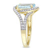 Oval Aquamarine and 0.48 CT. T.W. Diamond Bypass Frame Engagement Ring in 14K Gold