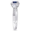 Blue and White Sapphire and 0.12 CT. T.W. Diamond Frame Three Stone Engagement Ring in 14K White Gold