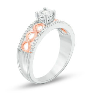 0.18 CT. T.W. Diamond Twist Shank Promise Ring in Sterling Silver and 10K Rose Gold