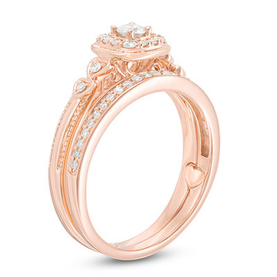 0.37 CT. T.W. Diamond Cushion Frame Interlocking Bridal Set in 10K Rose Gold