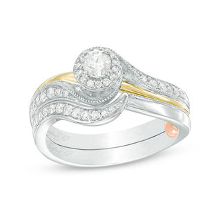 0.40 CT. T.W. Diamond Swirl Bypass Interlocking Bridal Set in 10K Two-Tone Gold