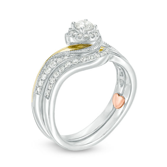 0.40 CT. T.W. Diamond Swirl Bypass Interlocking Bridal Set in 10K Two-Tone Gold