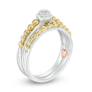 0.12 CT. T.W. Composite Diamond Bubble Interlocking Bridal Set in 10K Two-Tone Gold