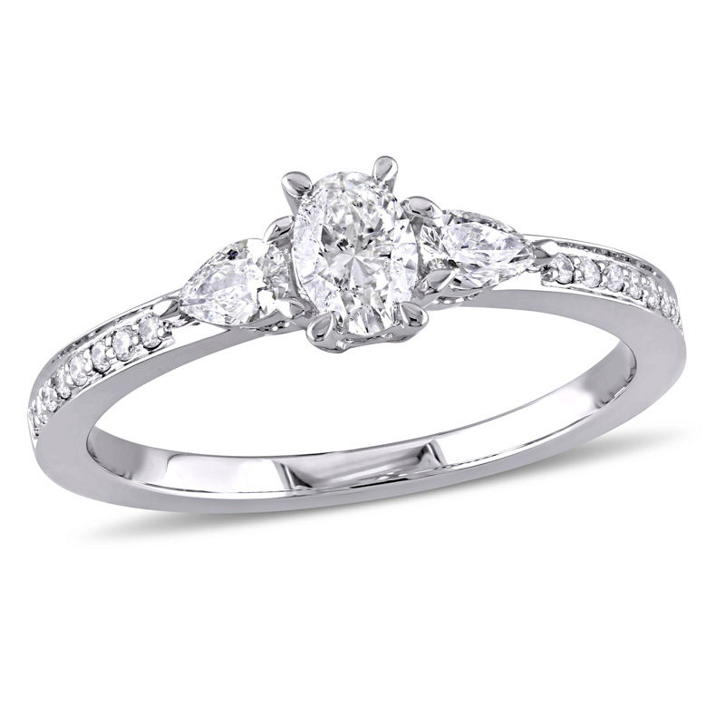 0.61 CT. T.W. Oval and Pear-Shaped Diamond Three Stone Engagement Ring in 14K White Gold|Peoples Jewellers