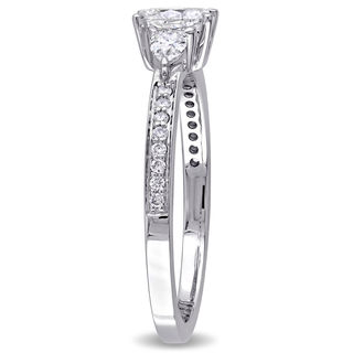 0.61 CT. T.W. Oval and Pear-Shaped Diamond Three Stone Engagement Ring in 14K White Gold