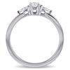 0.61 CT. T.W. Oval and Pear-Shaped Diamond Three Stone Engagement Ring in 14K White Gold