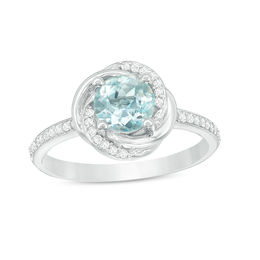 6.0mm Sky Blue Topaz and 0.15 CT. T.W. Diamond Orbit Frame Ring in 10K White Gold