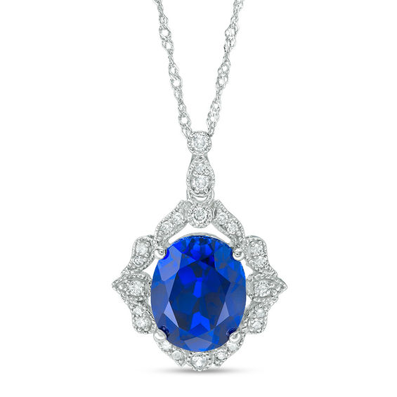 Oval Lab-Created Blue Sapphire and 0.15 CT. T.W. Diamond Vintage-Style Vine Frame Pendant in 10K White Gold