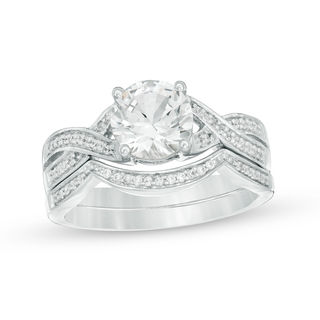 7.0mm Lab-Created White Sapphire and 0.145 CT. T.W. Diamond Twist Bridal Set in 10K White Gold