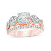 Thumbnail Image 0 of Lab-Created White Sapphire and 0.45 CT. T.W. Diamond Twist Bridal Set in 10K Rose Gold