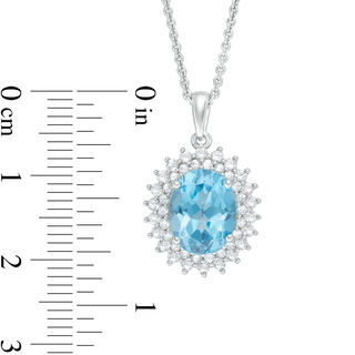 Oval Swiss Blue Topaz and Lab-Created White Sapphire Sunburst Frame Pendant in Sterling Silver