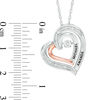 Unstoppable Love™ Couple's Diamond Accent Tilted Heart Pendant in Sterling Silver and 10K Rose Gold (2 Lines)